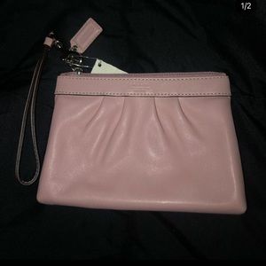 Baby pink Coach wristlet